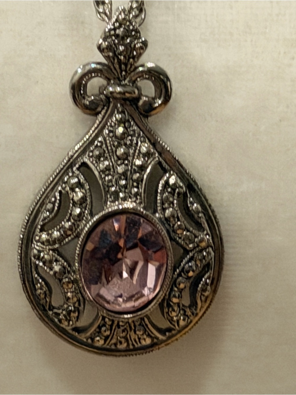 Ornate Silver-Tone Necklace with Pink Crystal Teardrop Pendant